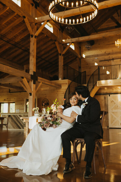 Bride and groom embrace