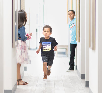 Kid running in children's dental office in Frisco Texas Thrive Dental