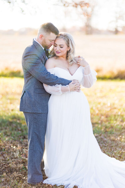 Couple portraits in a field at Nashville wedding
