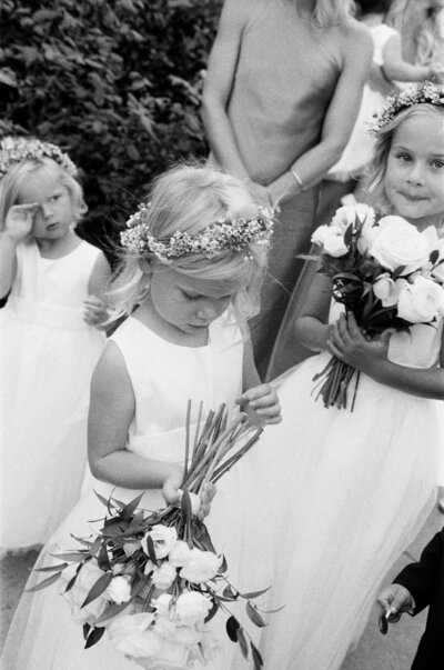 Bride and groom running down stairs on wedding day in Los Angeles