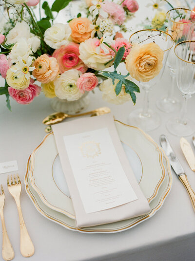 a wedding reception table set in the French style