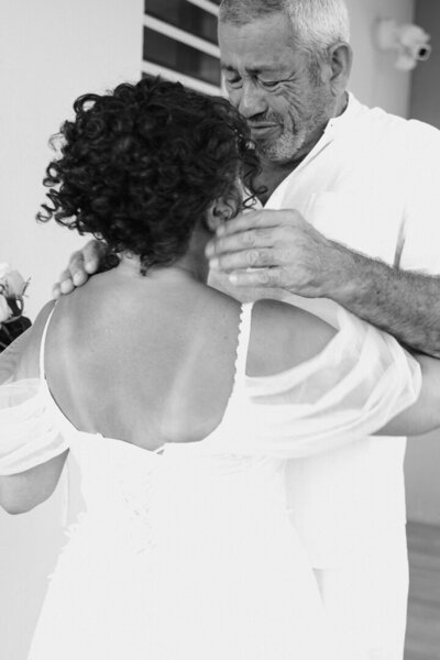 man holding women face