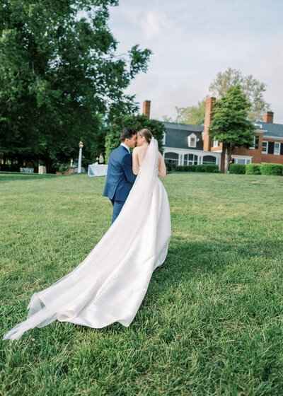 Bride and groom kissing at their wedding ceremony