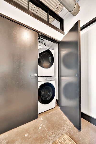Onsite laundry included in this one-bedroom, one-bathroom rental condo in the historic Behrens building just blocks from the Magnolia Silos and Baylor University in downtown Waco, TX.