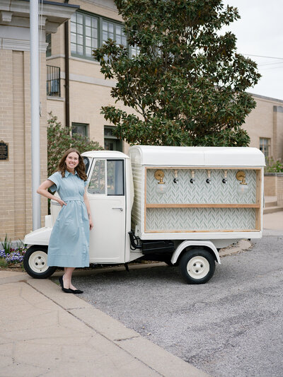 Personalized drink menu displayed on vintage bar cart
