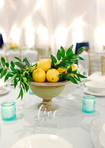 Bowl of lemons on an event dinner table