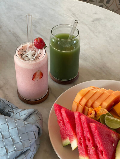 Fruit next to fruit smoothie