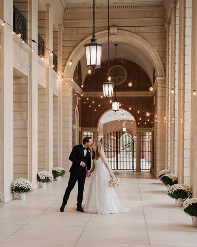 A bride and groom sharing a moment alone during their wedding at the Hall of Springs in Saratoga Springs, NY.