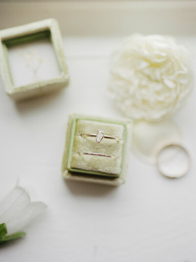 organic raw diamond engagement ring, ring box, flowers