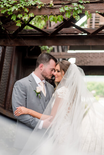 Bride and Groom embracing at Windows on the River in Cleveland Ohio