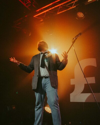 Lead Singer on stage looks up