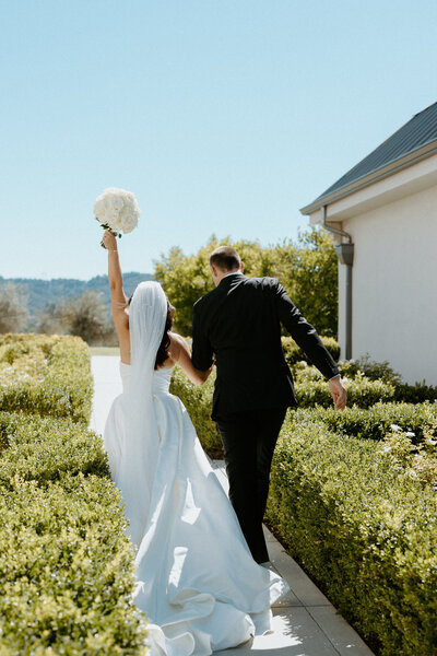 couple leans on walkway