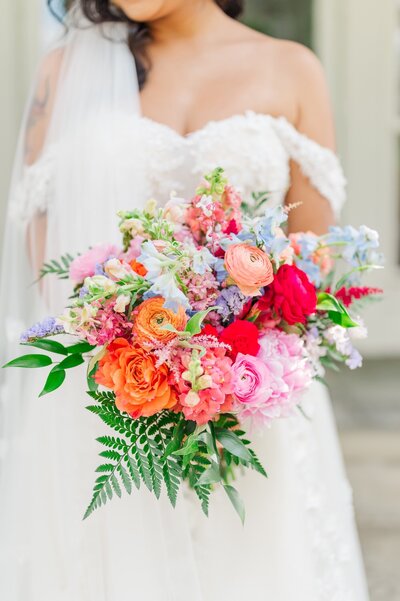 A colorful verona sunset bridal bouquet.
