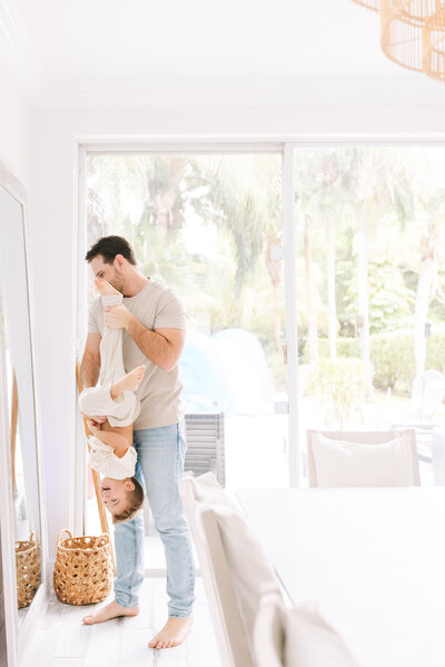 Family of 3 at sunrise in Ballast Point Park South Tampa