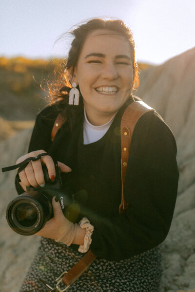 photographer headshot holding camera