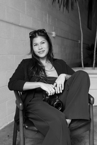 virginia wedding photographer susan ly sitting in chair