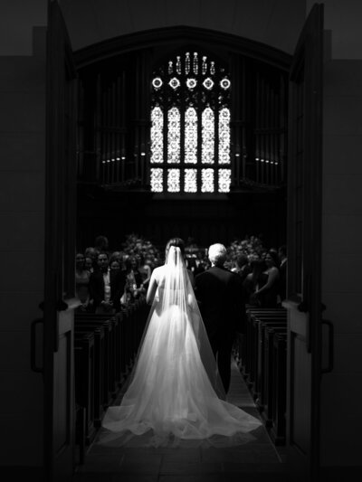 Bride and groom walking down the aisle at Manhattan's Grace Church