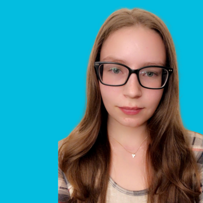 Woman Transitional Living Program Case Manager at Move forward with long dark hair and black glasses
