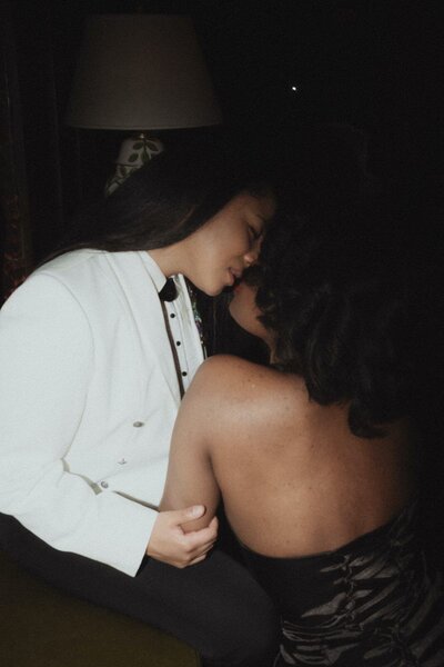 Two women kissing on their wedding day in Providence Rhode Island. Photography by Rhode Tripper Photography