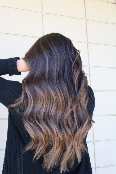 rich brunette balayage with caramel hair painting