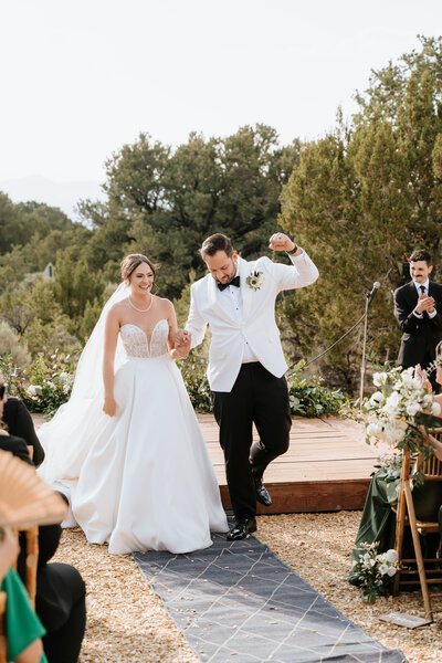 Bride and groom under veil in Taos New Mexico