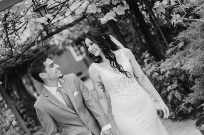 Bride & Groom holding hands walking