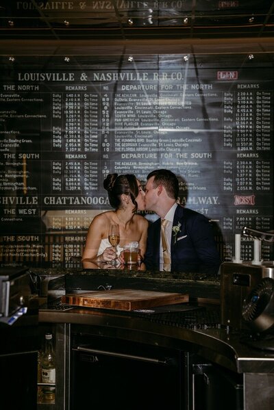 Bride and groom sharing a candid moment during their ceremony