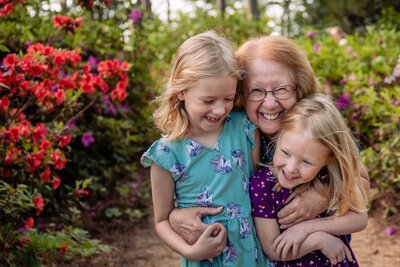 Grandma hugging young girls