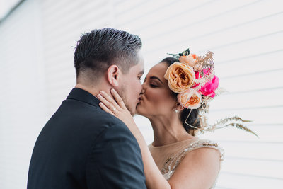 Canva - Bride and Groom Kissing