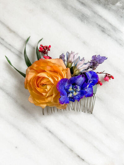 brightly colored flower comb