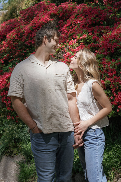 bride and groom holding hands at engagement session