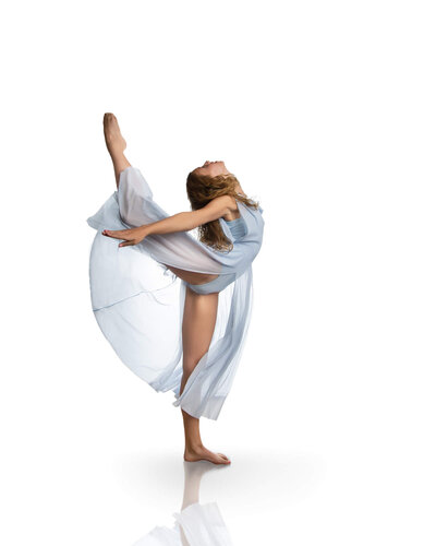 Portrait of a dancer in a back attitude wearing a light blue dance outfit by las vegas dance photographer, jessica bowles