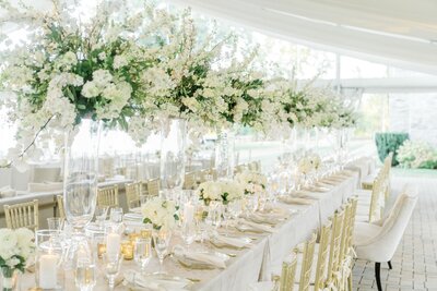 White floral arrangements on a reception table