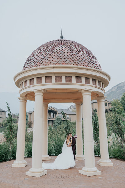 Bride and Groom underneath domed pagoda