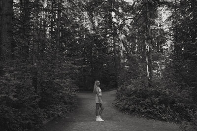 girl standing on trail in washington nature park