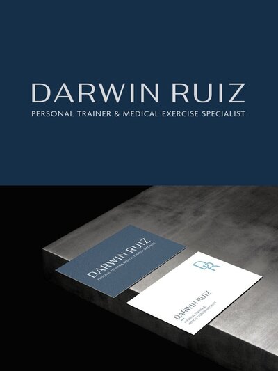 Business card mockups featuring Darwin Ruiz’s full name, professional title, and two branding options: one with the full logo and one with a stylized “DR” monogram on a clean white card.
