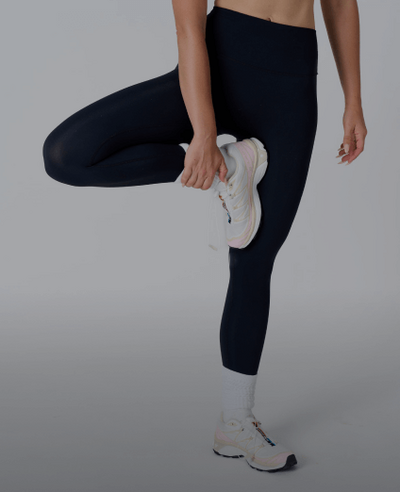 Women balancing on one leg 