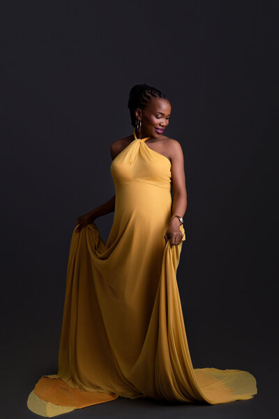 Black and white maternity photos of pregnant mommy