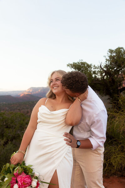 Couple hugging during their intimate elopement in Utah, photographed by Lamblight Photography
