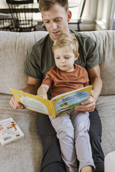 reading activity with a dad and son in carrollton texas