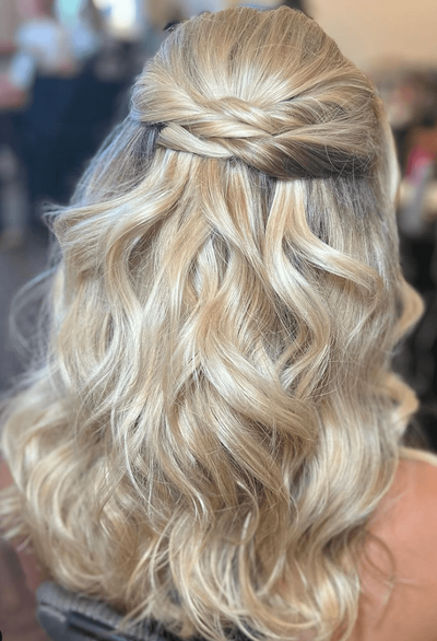 Romantic wedding hairdressers, Mistique Makeup in Dripping Springs, San Antonio and Dallas. Choose from soft curls, intricate braids, and flowing locks to complement your bridal look.