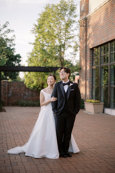 Bride and groom portrait at The Crawford in Naperville, captured by Chicago wedding photographer Abe Fernandez in a candid, documentary style using film and digital