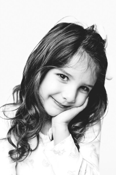 Black and white portrait of a cute little girl