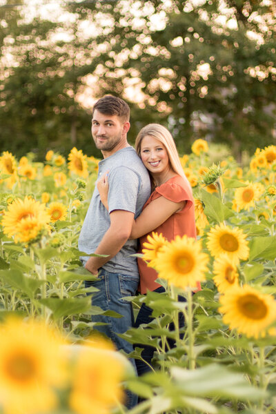 Couple in sunflower field