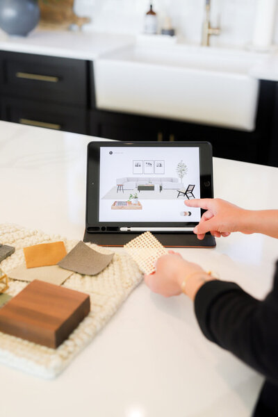 Rebekah designing a room on an ipad