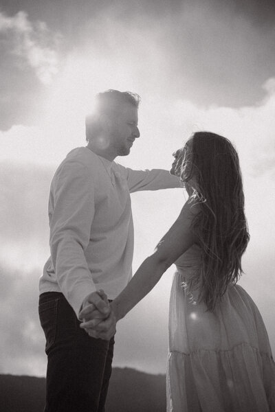 a couple in the sky dancing 