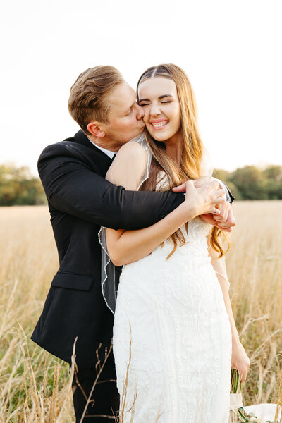 Sunset meadow view wedding portrait in Arkansas, praised in a Joy and Light Photography five-star review.