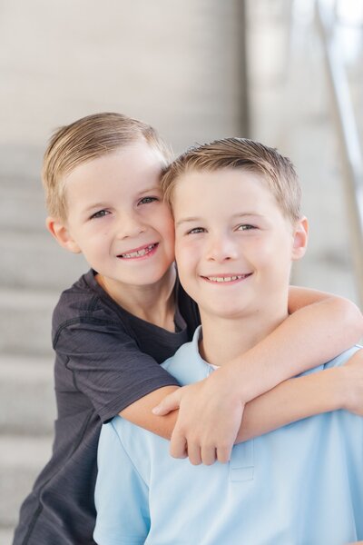 two brothers posing for a sibling portrait