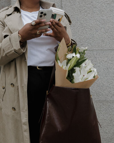 Confident woman in white jacket