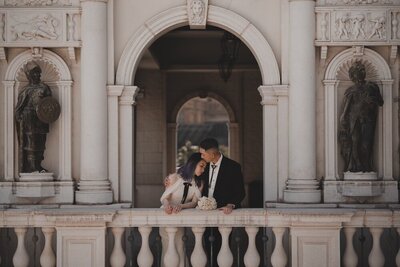 Tracy and Prescott photographed together on a balcony in Macau.